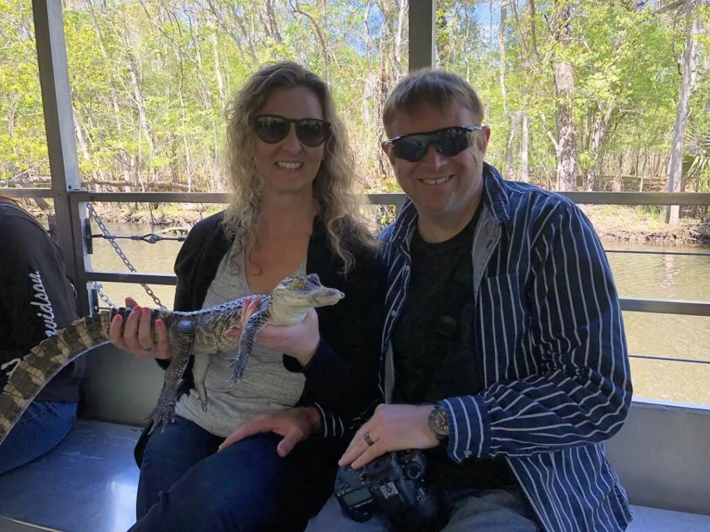 That Texas Couple holding a baby gator 