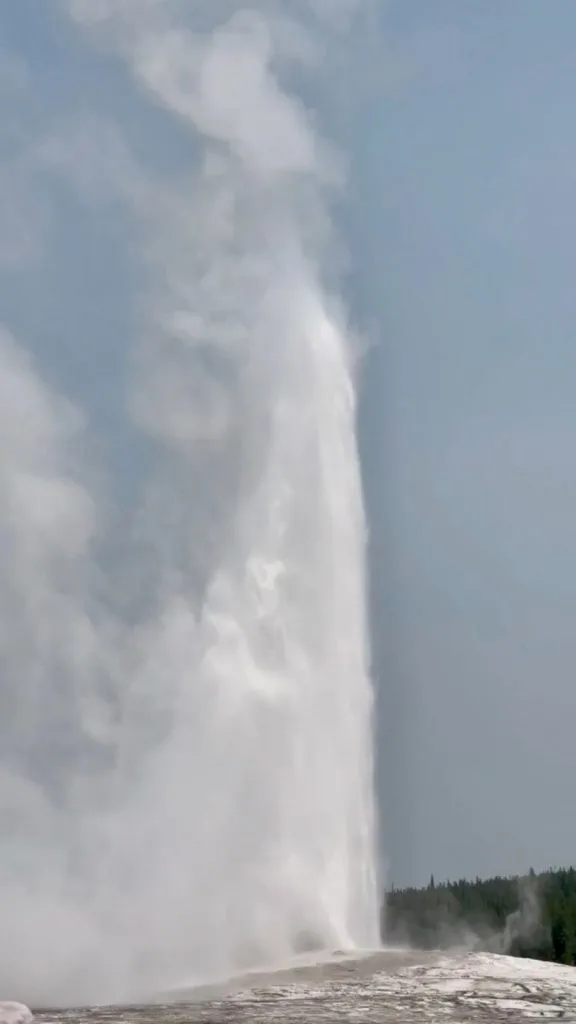 Old Faithful Geyser erupting-some airports near Yellowstone will put you close to this!