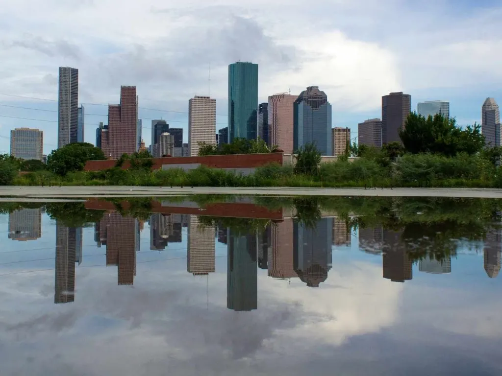 lake with the Houston skyline reflecting in it
