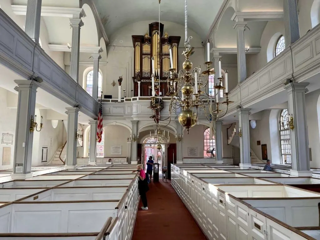 church with box pews and a large organ