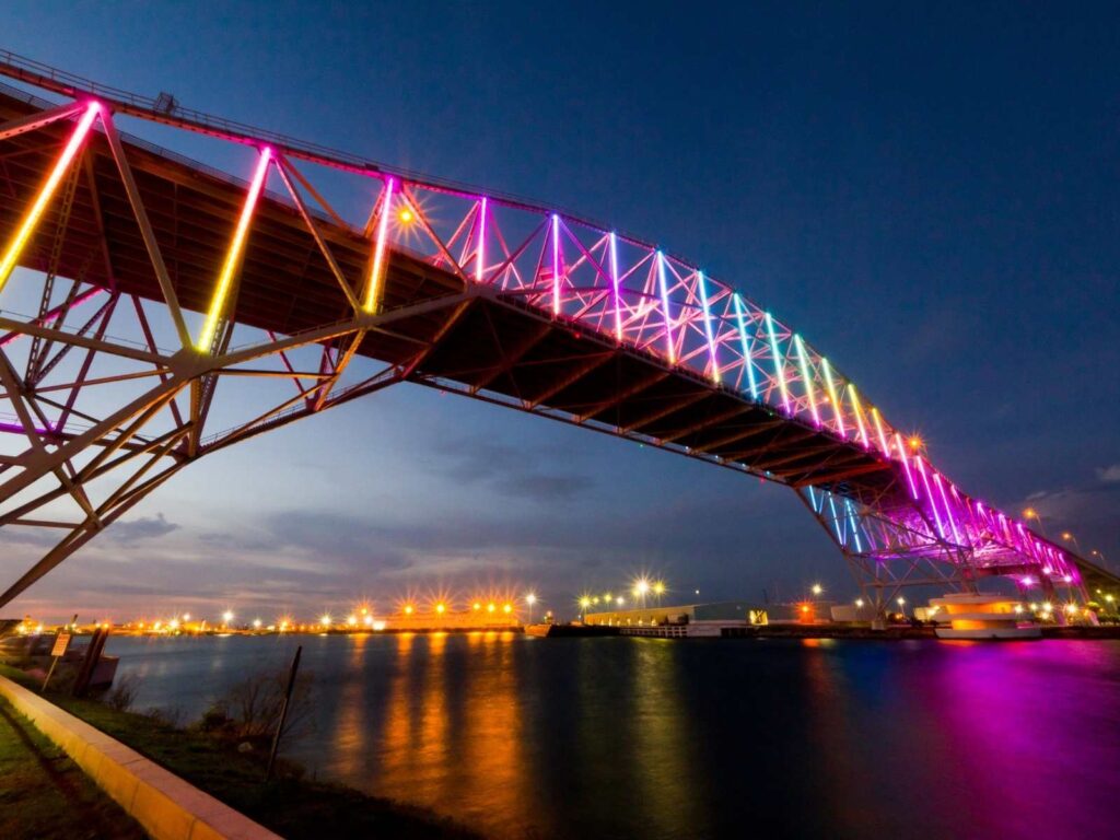 bridge with colored lights at night