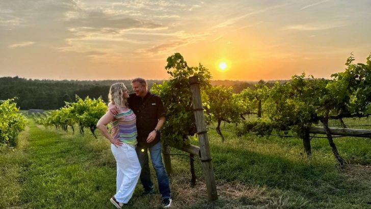 Marty and Michelle in Enoch's Stomp Vineyard at sunset
