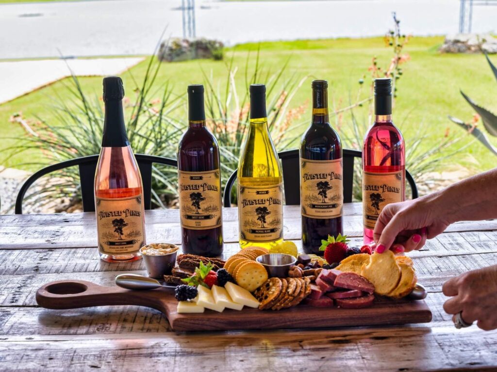 person eating off of a charcuterie board